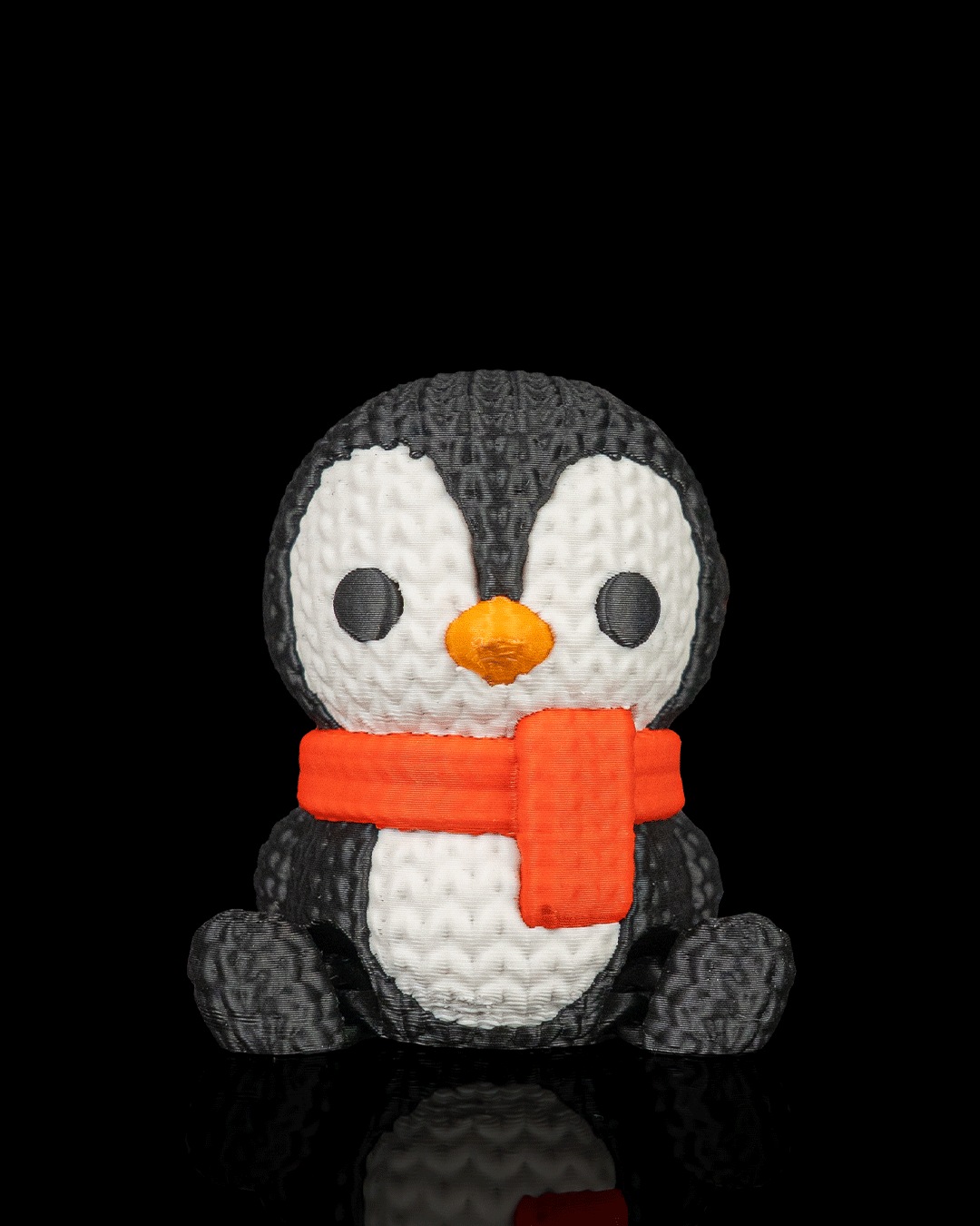 Minifigura pingüino navideño articulado impreso en 3D
