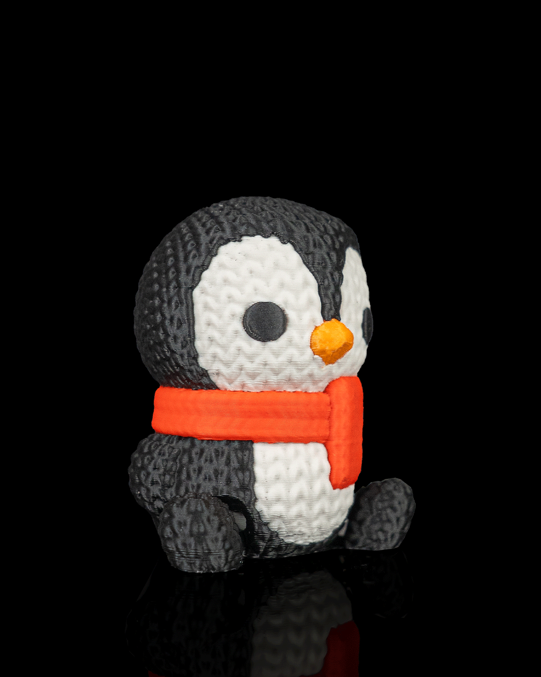 Minifigura pingüino navideño articulado impreso en 3D