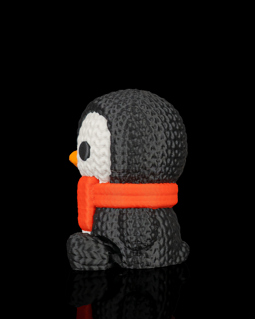 Minifigura pingüino navideño articulado impreso en 3D